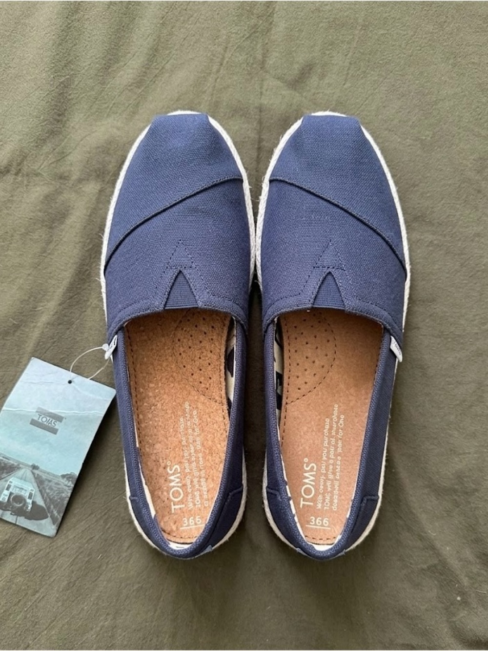Toms Women’s Navy Canvas Slip-On Loafers